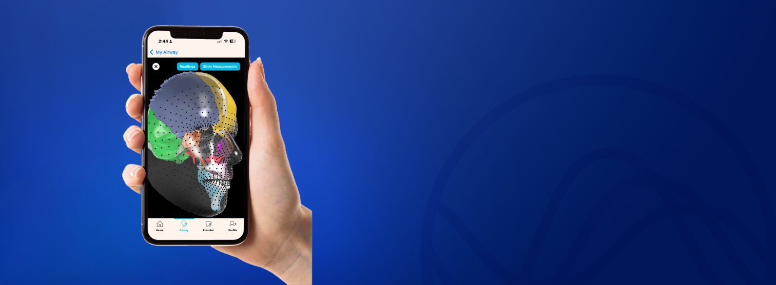 Hand holding a smartphone with a SONU Airway app 